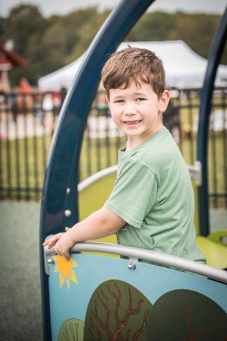 Boy on Mary-Go-Round