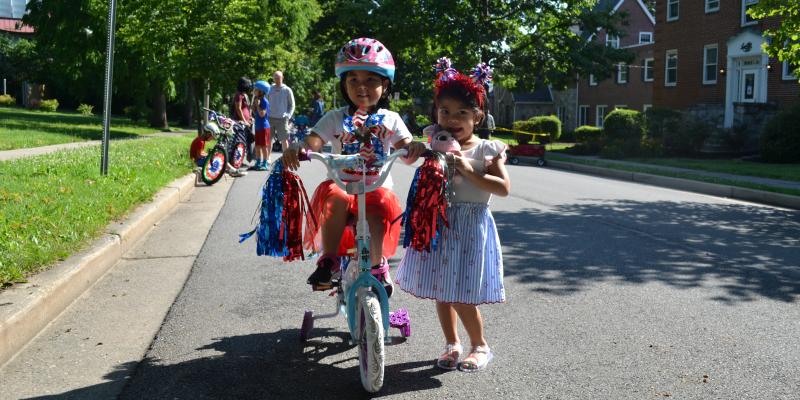 Child on decorated bike