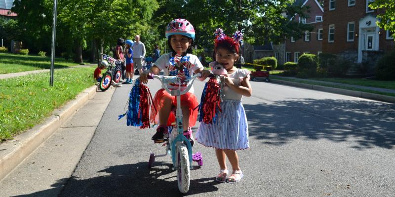 Child on decorated bike Child on decorated bike